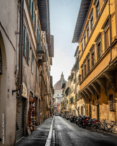 Dome of the Cathedral of Florence seen from between old buildings