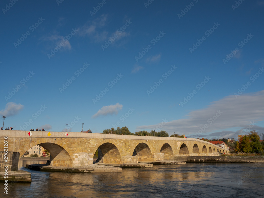 The Stone Bridge in Regensburg, Bavaria on a sunny day in October