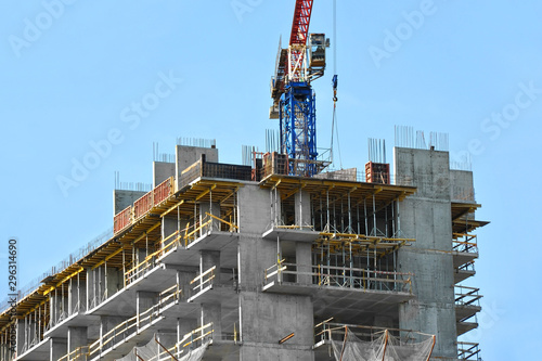 Crane and highrise construction site