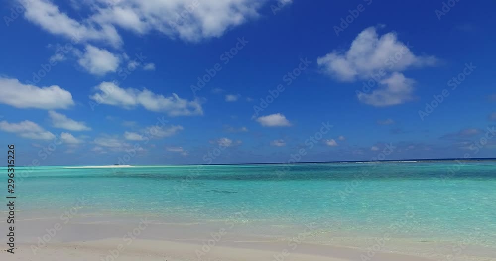 Looking out over a perfect beach view of pristine clear turquoise blue water in Hawaii Looking out over a perfect beach view of pristine clear turquoise blue water in Hawaii