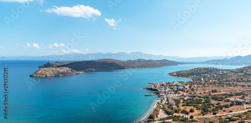 Fototapeta Naklejka Na Ścianę i Meble -  Spinalonga Island, Crete, Greece. October 2019. An overview of the former leper colony, Spinalonga on the Mirabella Sea, off of Plaka, Crete.