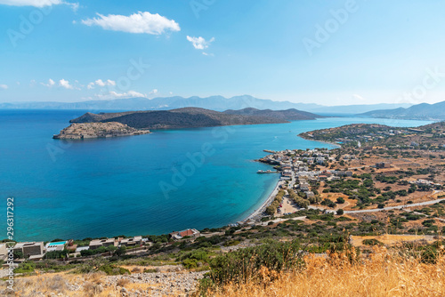 Fototapeta Naklejka Na Ścianę i Meble -  Spinalonga Island, Crete, Greece. October 2019. An overview of the former leper colony, Spinalonga on the Mirabella Sea, off of Plaka, Crete.