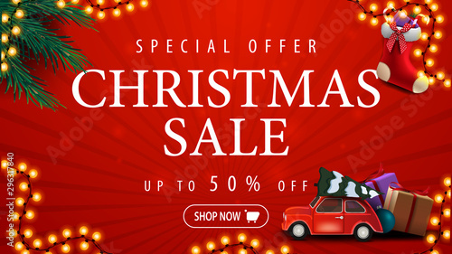Special offer, Christmas sale, up to 50% off, red discount banner with garland, Christmas tree branches, Christmas stockings and red vintage car carrying Christmas tree