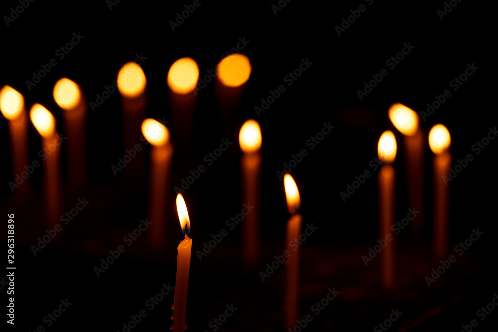 Candles Burning Creating Bokeh Background. Diwali decoration background - Candles burning in a zigzag pattern during indian festive celebration. Concept for hindu, christian, buddhist, tradition. Candles Burning Creating Bokeh Background. Diwali decoration background - Candles burning in a zigzag pattern during indian festive celebration. Concept for hindu, christian, buddhist, tradition.