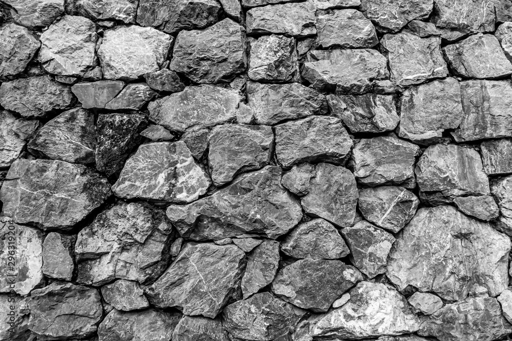 Fototapeta premium The grunge of stacked stone background or backdrop.