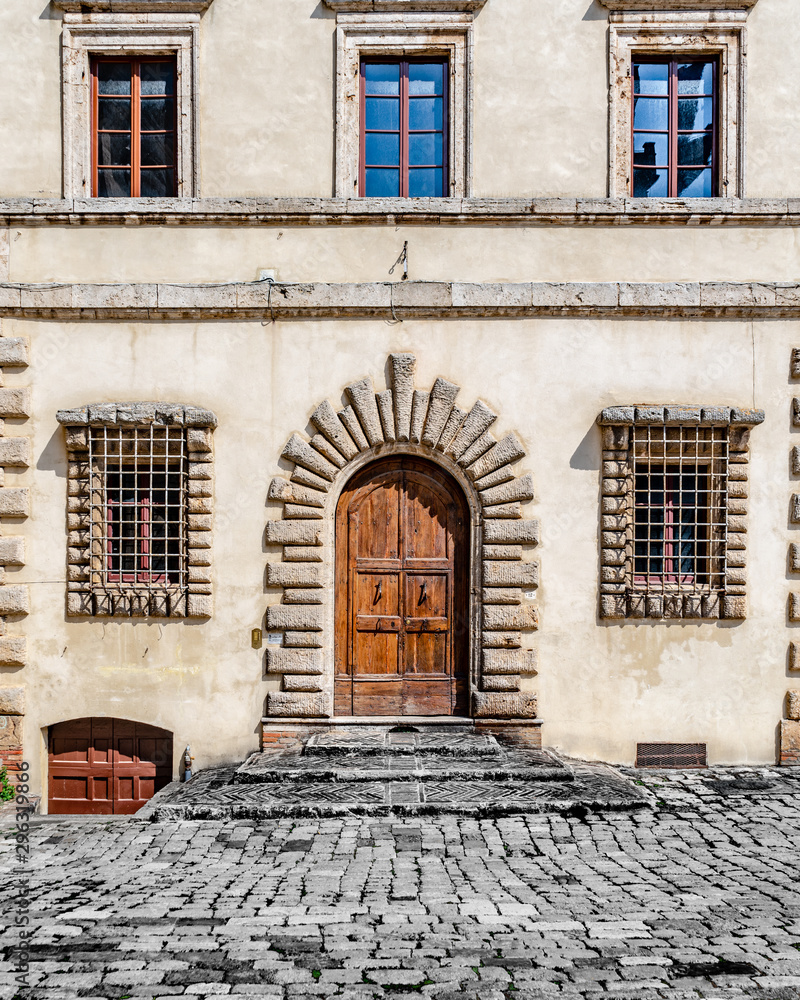 Old Door of an Old Stone Building In Montepulciano Italy