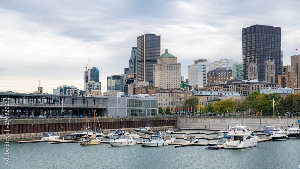 Montreal in Canada, view of the harbor and downtown, with modern and ancient buildings on the Saint-Laurent river