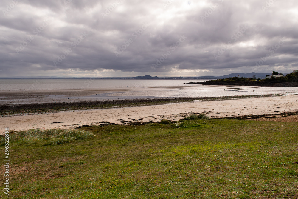 Silver Sands Beach in Aberdour. Aberdour is a scenic and historic village on the south coast of Fife, Scotland. Silver Sands beach is a blue flag beach.