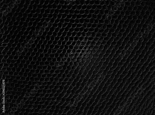 black abstract background and texture of oval cigarette liners