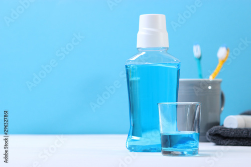 mouthwash on the table. Products to maintain oral cleanliness.