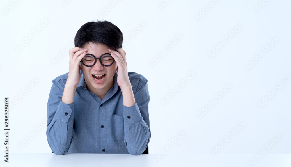 stressful asian man in blue shirt headache and painful portrait white background stressful asian man in blue shirt headache and painful portrait white background