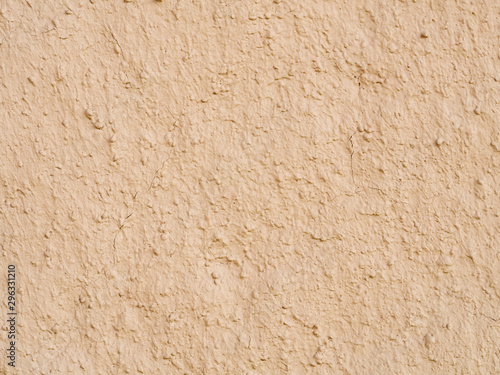 texture of a clay wall form a mud house
