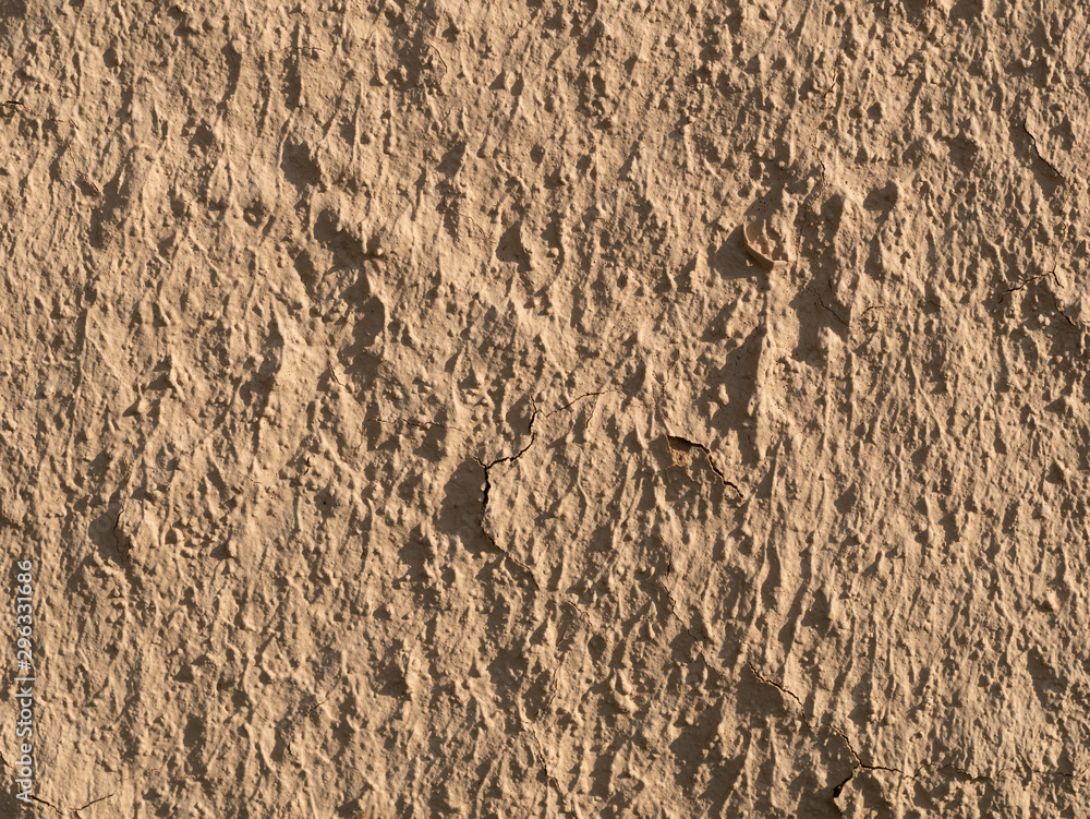 Naklejka premium texture of a clay wall form a mud house