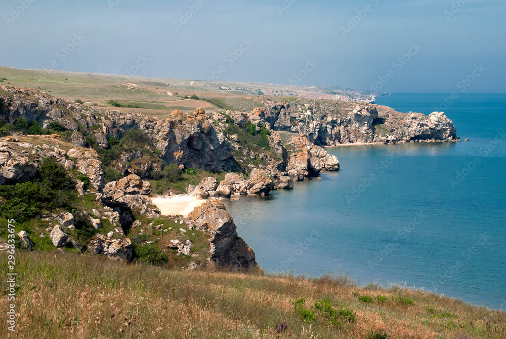 Crimea, Russia. Generals' Beaches. Bays of Elena. Scenic landscape of Azov Sea. Sandy seashore and cliffs under sky. Crimea, Russia. Generals' Beaches. Bays of Elena. Scenic landscape of Azov Sea. Sandy seashore and cliffs under sky.