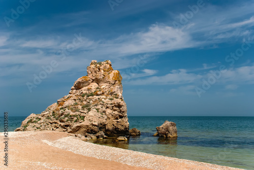 Crimea, Russia. Generals' Beaches. Bays of Elena. Scenic landscape of Azov Sea. Sandy seashore and cliffs under sky. photo