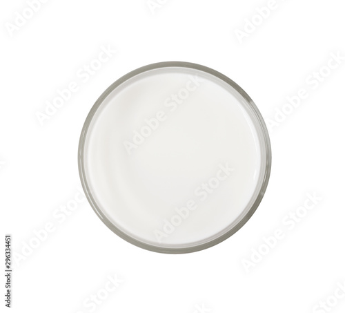 Top view of milk in glass cup isolated on white background