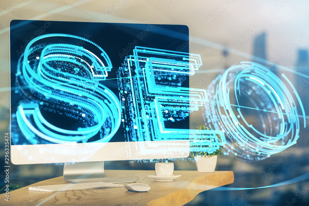 Multi exposure of table with computer and seo drawing hologram. Search optimization concept. Multi exposure of table with computer and seo drawing hologram. Search optimization concept.