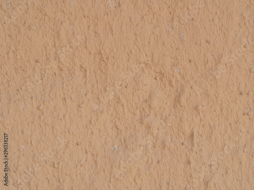 texture of a clay wall form a mud house