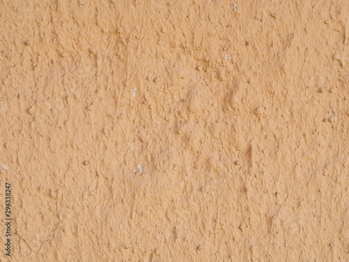 texture of a clay wall form a mud house