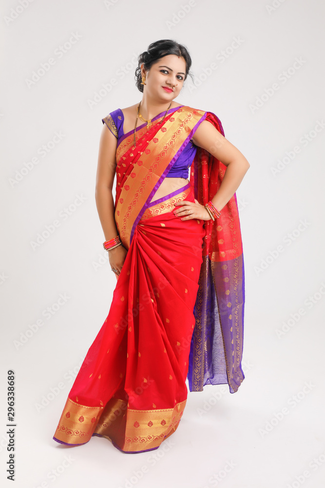 Happy Young indian woman wearing sari and Smiling Happy Young indian woman wearing sari and Smiling