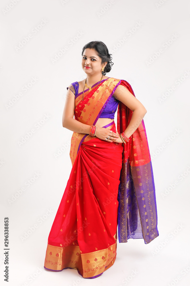 Happy Young indian woman wearing sari and Smiling Happy Young indian woman wearing sari and Smiling