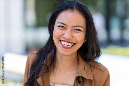 Portrait of beautiful young woman in urban area  photo