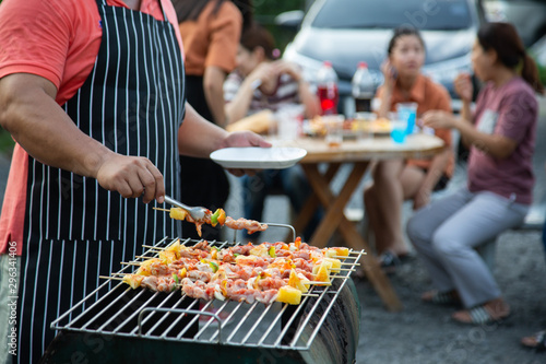 Barbeque Grill Street Food in thailand Eat outdoors in a happy family. holiday celebration concept