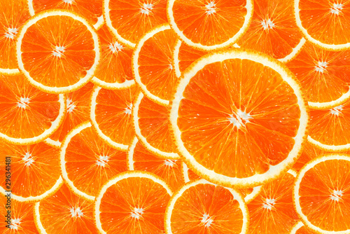 Top view of fresh juicy orange slices overlap for background.Texture,Wallpaper.
