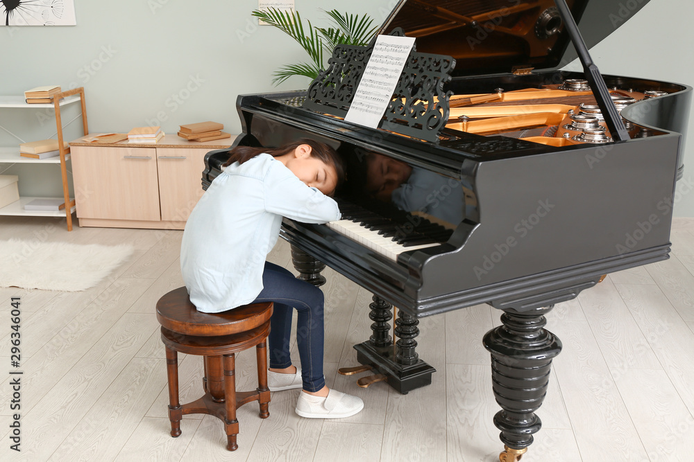 Little girl sleeping at grand piano Stock Photo Adobe Stock