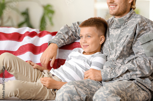 Happy military man with his...
