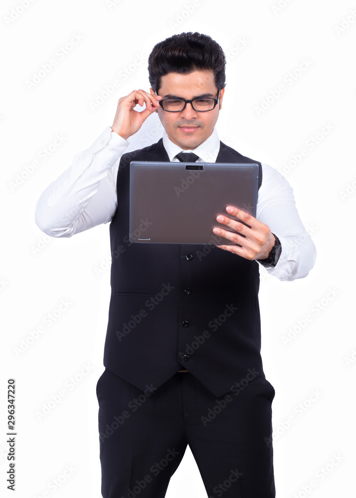 Confident businessman using digital tablet on white background Confident businessman using digital tablet on white background