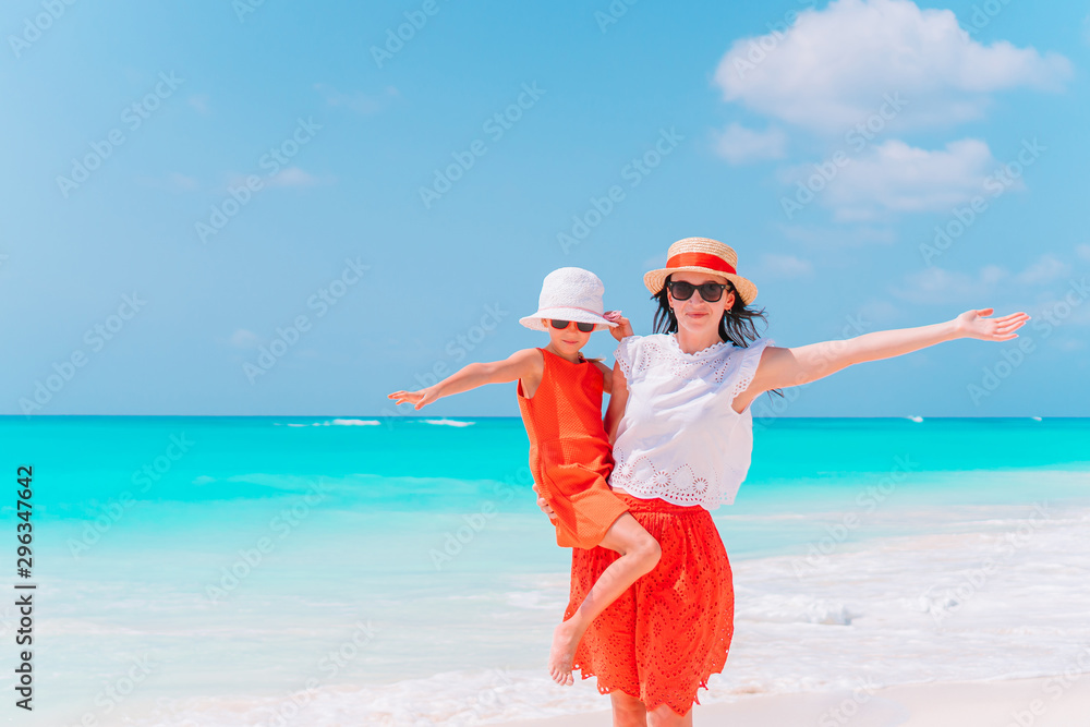 Portrait of little girl and mother on summer vacation