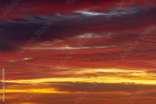 Sunset / sunrise with clouds, light rays and other atmospheric effect