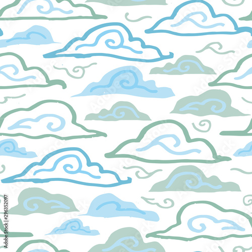 Grunge winter cloud pattern with hand drawn line doodle cloud in blue and icy tones on white background. Happy design for your perfect winter day and home decor.