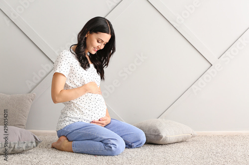 Beautiful young pregnant wo...