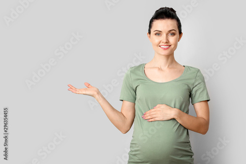 Beautiful young pregnant wo...