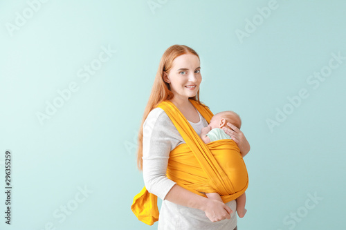 Mother with cute baby on co...