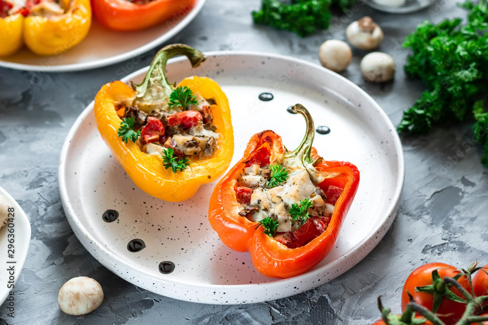 Baked pepper with chicken, mushrooms and tomatoes.