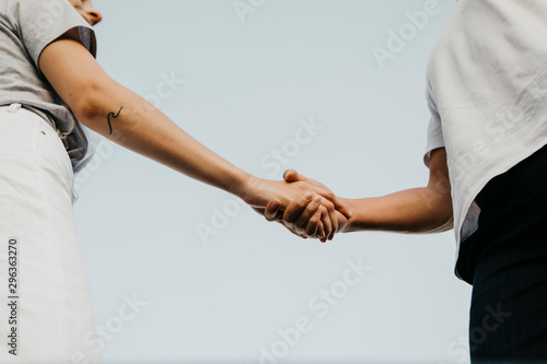 Young couple holding hands