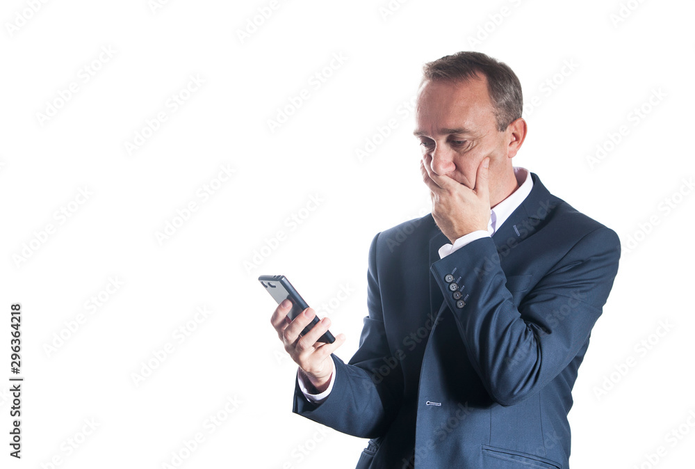 Man in suit on white background struggle with message on smartphone Man in suit on white background struggle with message on smartphone