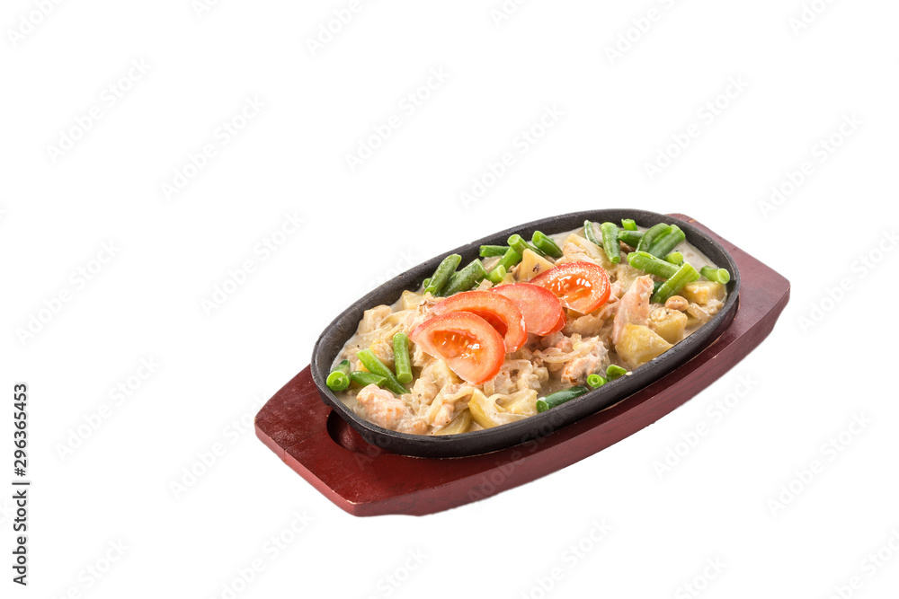 Green beans stewed with chicken meat in frying pan isolated on white background Green beans stewed with chicken meat in frying pan isolated on white background