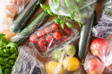 single use plastic waste issue. fruits and vegetables in plastic bags