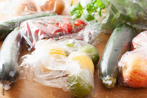 single use plastic waste issue. fruits and vegetables in plastic bags