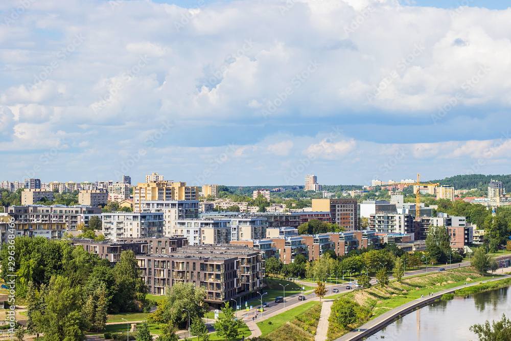 Beautiful and bright panorama of Vilnius old town from the top of the Gediminas hill with Gediminas tower and ruins of Upper castle on Vilnia river, Vilnius, Lithuania. 