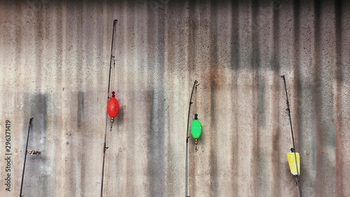 View of four colorful fishing rods