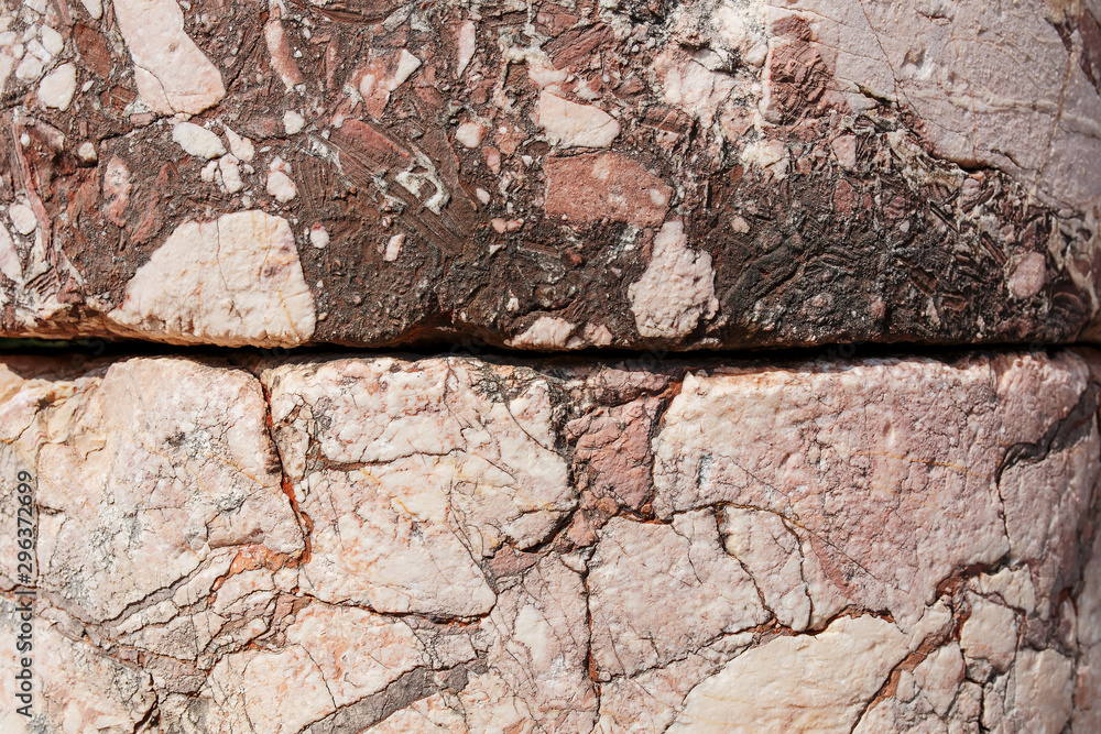 Fototapeta premium Pink marble with cracks, stone texture background, Full screen.