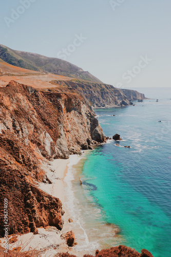 Aerial view of beach cliffs and turquoise sea © Michael DePetris