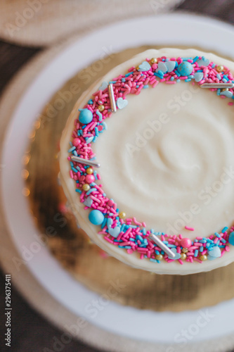 Overhead view of cake garnish with sprinkles photo