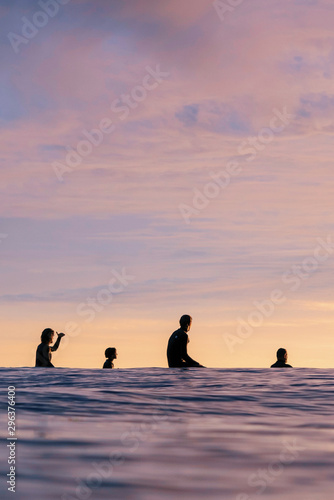 Surfers waiting for a wave in the ocean