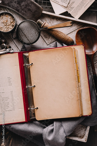 Overhead view of recipe book and utensils